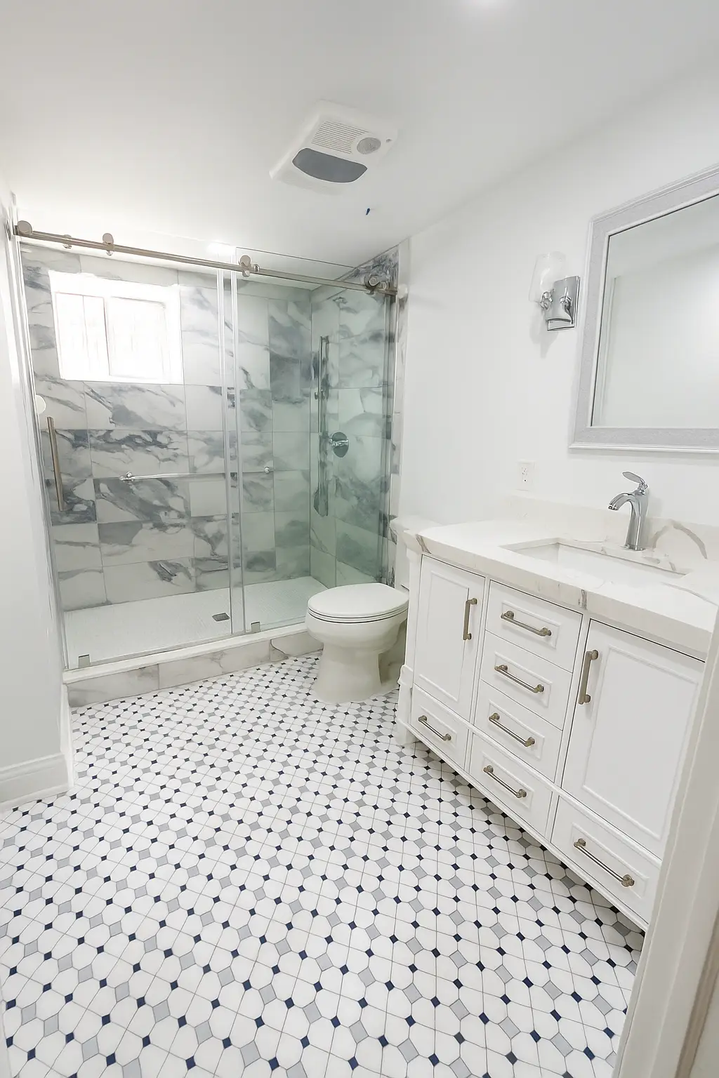 Modern basement bathroom with tiled shower and custom vanity in Covington, GA