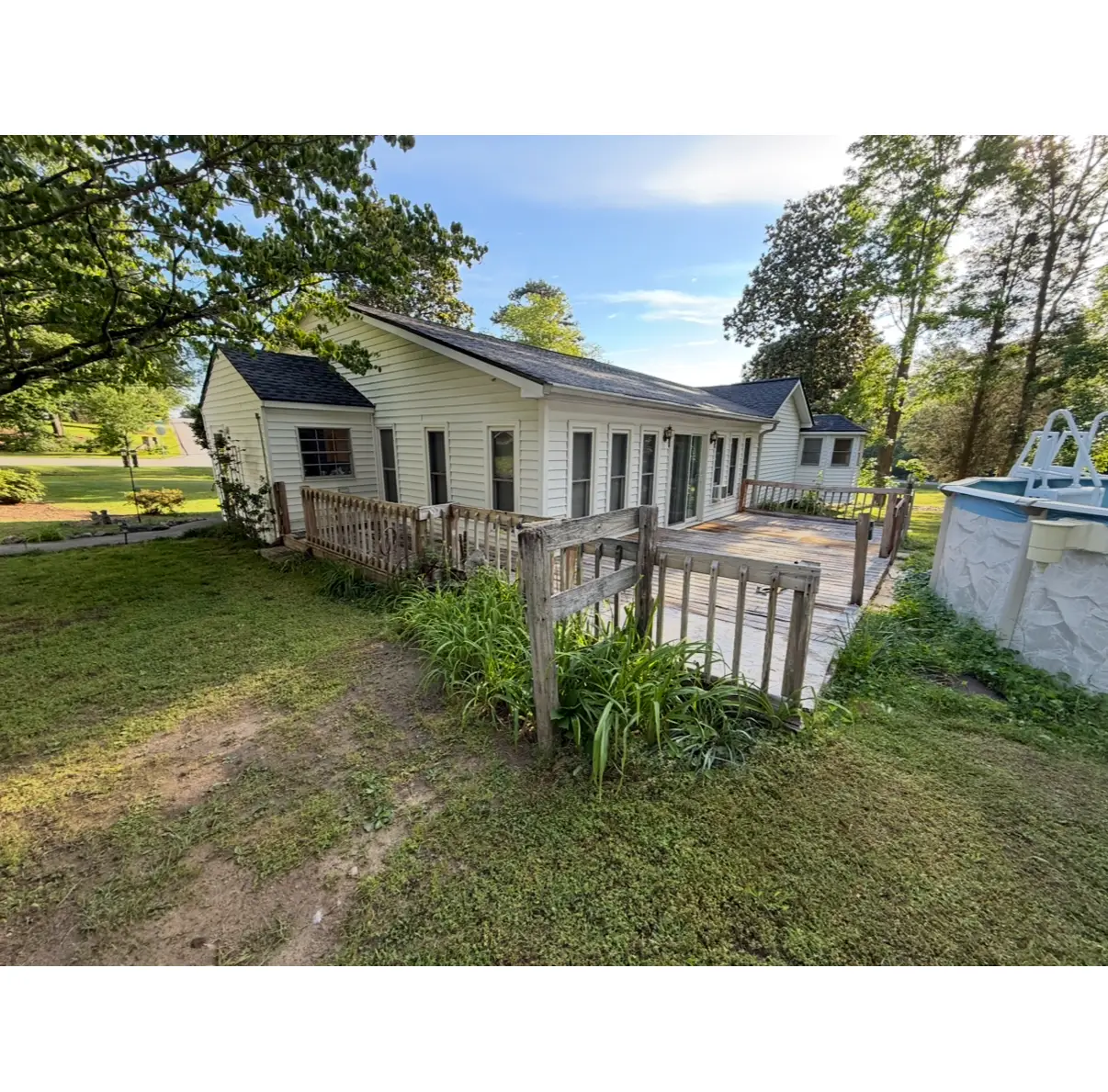 Aging deck structure before renovation by Handz on Homes